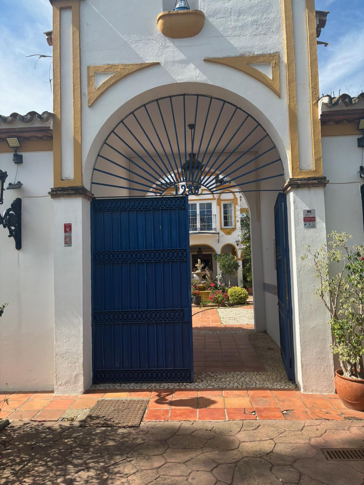 The iconic entrance to AIM School in Mijas, Malaga