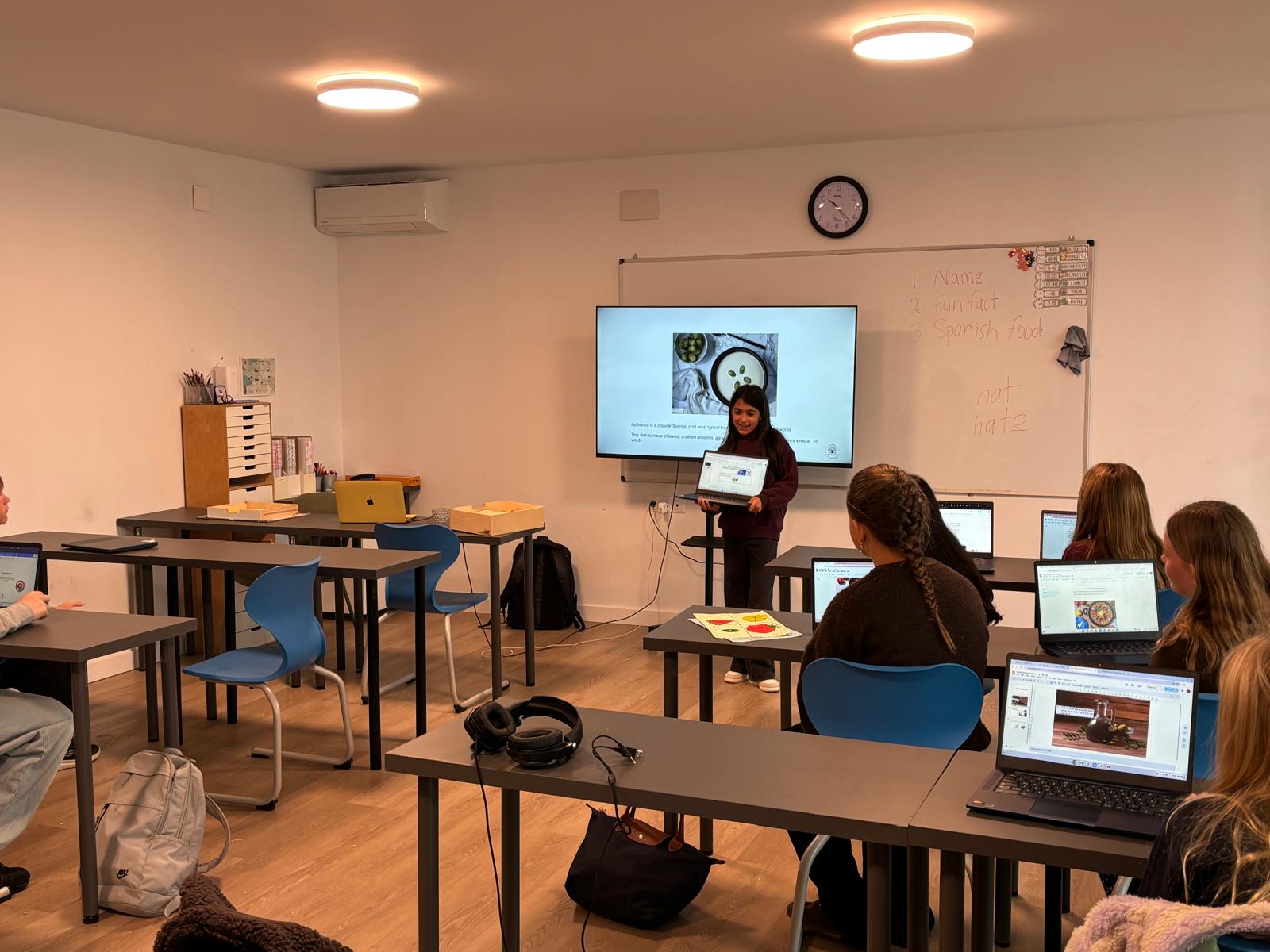 AIM Primary student presenting to classmates